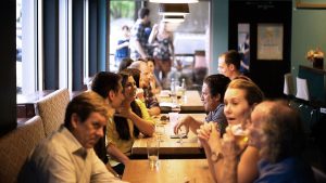 People drinking at a social business event