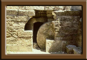 stone in front of tomb
