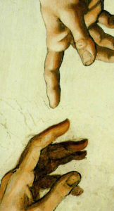 hand reaching down to another hand