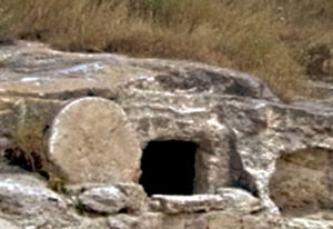 tomb with stone rolled away