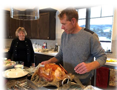Man carving turkey